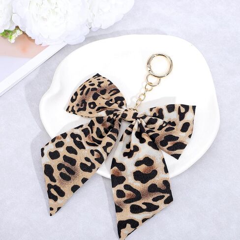 ليوبارد طباعة المفاتيح لطيف القوس Bowknot محفظة حمل حقيبة سحر Y2k خمر سحر قلادة حقائب الظهر اكسسوارات للفتيات النساء حلقات مفاتيح السيارة in Kuwait
