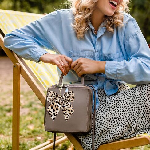 ليوبارد طباعة المفاتيح لطيف القوس Bowknot محفظة حمل حقيبة سحر Y2k خمر سحر قلادة حقائب الظهر اكسسوارات للفتيات النساء حلقات مفاتيح السيارة in Kuwait