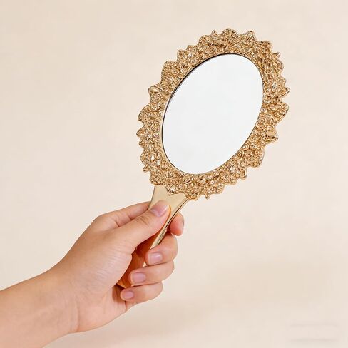 مرآة يد كلاسيكية من OIGUMR، مرآة مكياج بيضاوية محمولة مقاس 9.5 × 5 بوصة للنساء، مرآة زينة للسفر بمقبض مزخرف (1، ذهبي وردي، 9.5 × 5 بوصة) in Kuwait