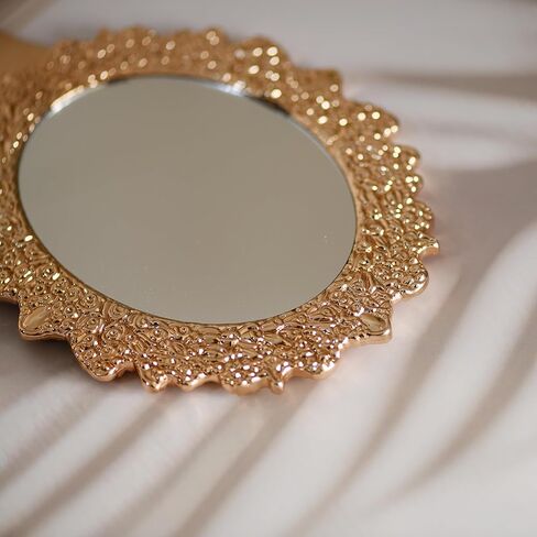 مرآة يد كلاسيكية من OIGUMR، مرآة مكياج بيضاوية محمولة مقاس 9.5 × 5 بوصة للنساء، مرآة زينة للسفر بمقبض مزخرف (1، ذهبي وردي، 9.5 × 5 بوصة) in Kuwait