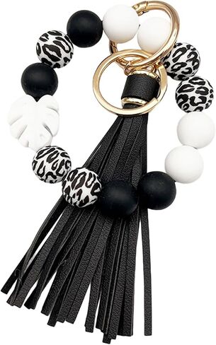 سلسلة مفاتيح على شكل ورقة شجر معصم للنساء، حلقة مفاتيح مطرزة من السيليكون، حامل مفاتيح السيارة، سوار إسورة مرن من الجلد بشرابة in Kuwait