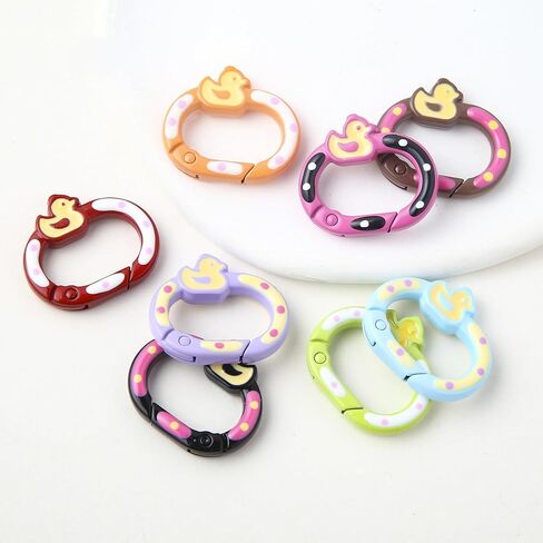 12 قطعة من المشابك الدائرية البيضاوية الربيعية، مشبك محفظة معدني صغير على شكل بطة على شكل حلقة مفاتيح لسحر الحقائب، وسحر المحفظة، وسلاسل المفاتيح in Kuwait