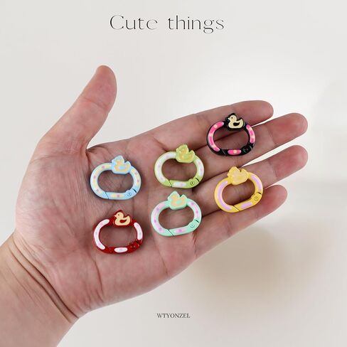 12 قطعة من المشابك الدائرية البيضاوية الربيعية، مشبك محفظة معدني صغير على شكل بطة على شكل حلقة مفاتيح لسحر الحقائب، وسحر المحفظة، وسلاسل المفاتيح in Kuwait