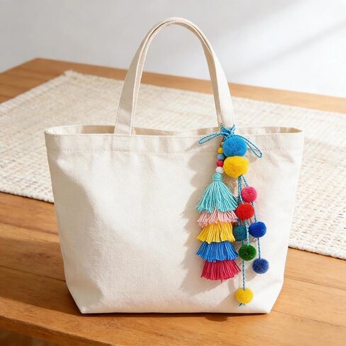 QTMY Pom Pom Tassel Long Bag Pendant Charm Keyring Keychain for Women Purse Handbag Decor in Saudi Arabia
