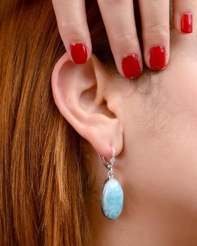 Earrings, oval pendants with 925 sterling silver lever-back closures, handmade with blue stones. Crafted artisanally. in Saudi Arabia