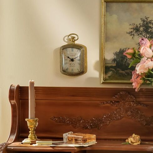 ساعة حائط صغيرة ذهبية عتيقة من NIKKY HOME، ساعات تناظرية معدنية مزخرفة صامتة تعمل بالبطارية للحمام والمطبخ وغرفة المعيشة وغرفة النوم والمكتب (6.1 بوصة ارتفاع × 3.7 بوصة عرض) in Saudi Arabia
