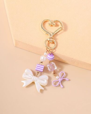 حقيبة على شكل فيونكة لؤلؤية للنساء، سلسلة مفاتيح على شكل فراشة بناتي لحقيبة الظهر، ملحق مفتاح سلسلة قلب صغير، تزيين محفظة لطيف in Kuwait