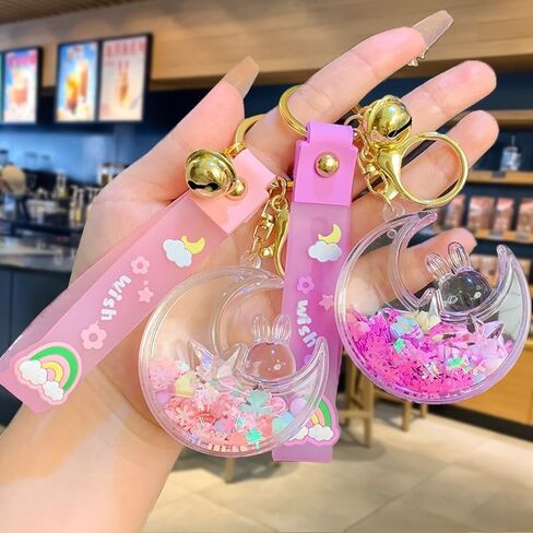 HSYHERE Women Girls Beautiful Creative Sleeping on Moon Rabbit Moving Sand Keychain Flowing Sand Pendant Metal Key Ring in Saudi Arabia