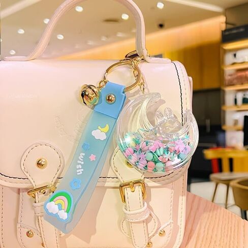 HSYHERE Women Girls Beautiful Creative Sleeping on Moon Rabbit Moving Sand Keychain Flowing Sand Pendant Metal Key Ring in Saudi Arabia