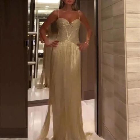 فستان نسائي عالي الخصر بدون أكمام بلون خالص للحفلات الراقصة مزين بالترتر وشرابة in Saudi Arabia