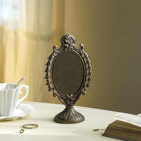 NIKKY HOME Vintage Baroque Tabletop Vanity Mirror, Antique Bronze Oval Standing Makeup Mirror with Decorative Frame for Bedroom, Dressing Room, Living Room in Saudi Arabia