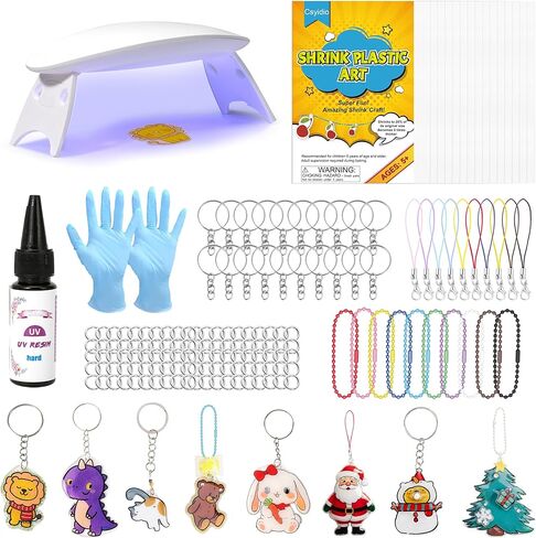 Csyidio 160PCS Shrink Plastic Sheet Kit with 15PCS Shrink Papers, UV Resin, UV Lamp and Keychains Accessories for Kids Craft Ornaments, DIY Key Chains & Christmas Decor in Kuwait