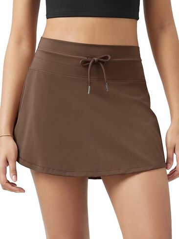 ODODOS Women's Drawstring Tie Daily Skirts Built-in Shorts Athletic Golf Tennis Skorts with Ball Pocket in Saudi Arabia