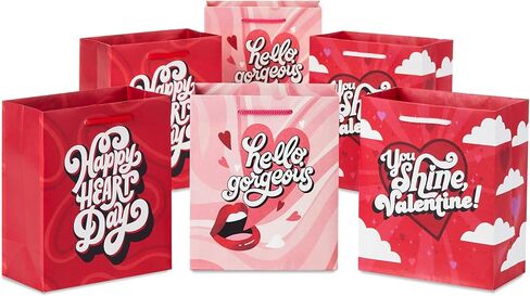 Hallmark 8" Medium Valentine's Day Gift Bags with Tissue Paper (3 Bags: Red with Black, Pink, White Stripes and Hearts) in Kuwait