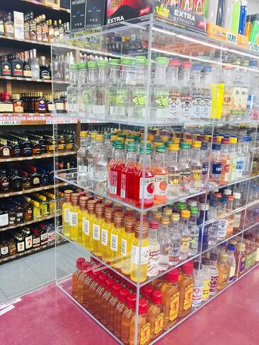 Commercial Retail Display for Mini Sampler 50ml Liquor Shot Airplane Bottles Nips Rack Also Any Other Point of Sale Items 12 Section in Saudi Arabia