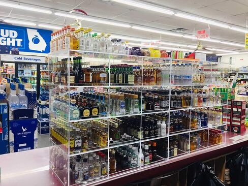 Commercial Retail Display for Mini Sampler 50ml Liquor Shot Airplane Bottles Nips Rack Also Any Other Point of Sale Items 12 Section in Saudi Arabia