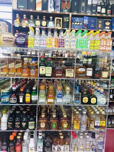 Commercial Retail Display for Mini Sampler 50ml Liquor Shot Airplane Bottles Nips Rack Also Any Other Point of Sale Items 12 Section in Saudi Arabia