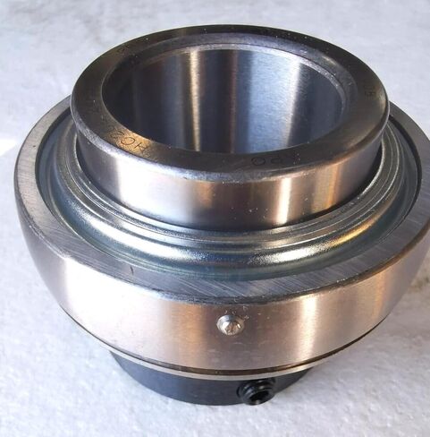 HC208-24R3 محمل إدراج مع أختام ثلاثية الشفاه وطوق قفل NA208-24L3، الأبعاد 1-1/2" القطر الداخلي الدائري، OD كروي 3.1496"، عرض OD 0.8661"، العرض الإجمالي 2.2165" in Saudi Arabia