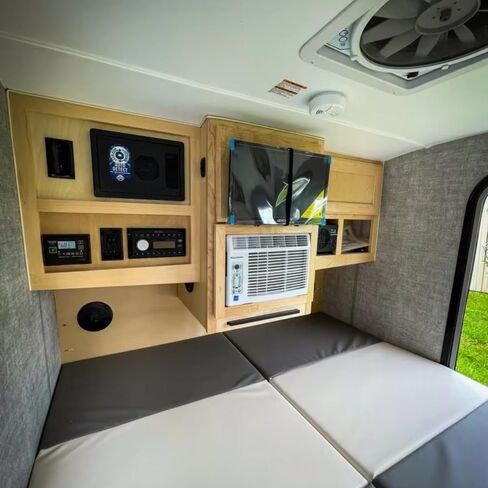 Rugged All-Terrain Teardrop Camper Trailer Luxury Travel Trailer, Designed for Rock Crawling Adventures and Overlanding Convoys, Featuring Integrated LED Light Bar and Spare Tire Mount in Saudi Arabia