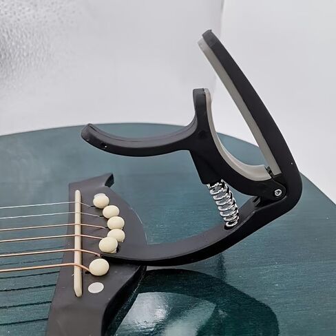 Beginner Guitar Capo - Quick Change Clamp for Acoustic & Electric Guitar,Ukulele,Mandolin, Easy to Use,Stainless Steel Spring, Rubber Pads,Portable (Black) in Saudi Arabia