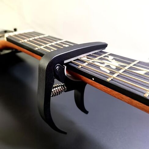 Beginner Guitar Capo - Quick Change Clamp for Acoustic & Electric Guitar,Ukulele,Mandolin, Easy to Use,Stainless Steel Spring, Rubber Pads,Portable (Black) in Saudi Arabia