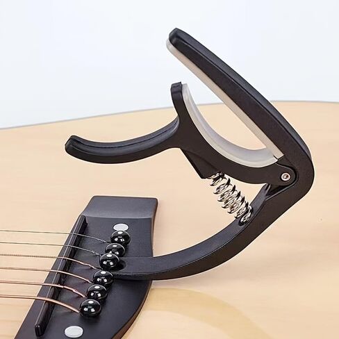 Beginner Guitar Capo - Quick Change Clamp for Acoustic & Electric Guitar,Ukulele,Mandolin, Easy to Use,Stainless Steel Spring, Rubber Pads,Portable (Black) in Saudi Arabia