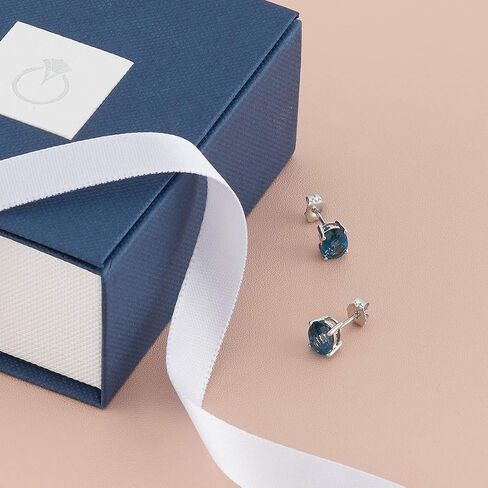 Peora 14K White Gold London Blue Topaz Earrings for Women, Natural Gemstone Classic Solitaire Studs, 7x5mm Oval Shape, 2 Carats total, Friction Back in Saudi Arabia