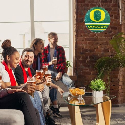 لافتة حائط بغطاء زجاجة معدنية من FOCO Oregon Ducks مقاس 13 بوصة NCAA، 13 بوصة - طراز عتيق متعثر، مرخصة رسميًا in Saudi Arabia