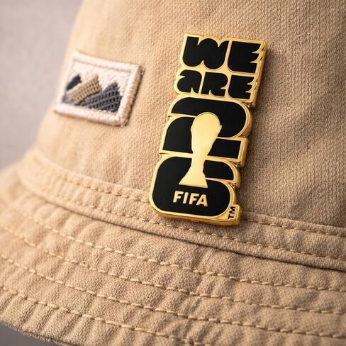 Official FIFA World Cup 2026 “We Are 26" Enamel Pin – 1.5" Black & Gold Lapel Badge – Premium Zinc Alloy Collector’s Souvenir – 2D Lacquer Emblem for Hats, Jackets, Backpacks & Lanyards in Kuwait