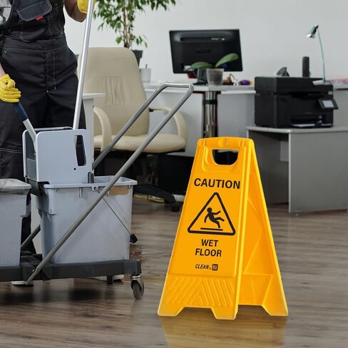 Restaurantware RW Clean 11.8 x 2 x 24.4 Inch Wet Floor Sign 1 Double-Sided Caution Sign - Built-In Handle Foldable Yellow Plastic Cleaning Signs For Commercial Use in Saudi Arabia