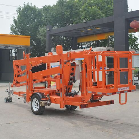 Versatile Towable Boom Lift with Hydraulic Control Lever, 360° Rotation, Articulated Cherry Picker Lift with Wear-Resistant Tires & Manganese Steel Legs for Warehouse & Factory Workshop Applications in Saudi Arabia