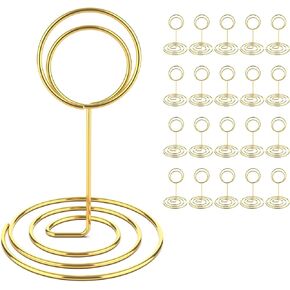 20 قطعة من حاملات أرقام الطاولة الذهبية، وحاملات بطاقات مكان مقاس 6 بوصات مع قاعدة موسعة، وحوامل صور سلكية للطاولات، ومشابك قائمة الأسماء لحفلات الزفاف، والقطع المركزية والمناسبات in Kuwait