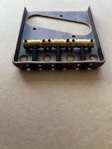 Aged Red Bronze Telecaster Bridge – Ashtray with Brass Saddles, Fits Tele Guitars – 10.8mm String Spacing, Antiqued Finish – String-Through or Top-Load – Includes Wrench in Kuwait
