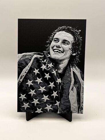 3D print of USA Hockey game winning scorer Jack Hughes wrapped in the American flag after USA Men's hockey wins the Gold medal. in Saudi Arabia