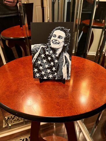 3D print of USA Hockey game winning scorer Jack Hughes wrapped in the American flag after USA Men's hockey wins the Gold medal. in Saudi Arabia