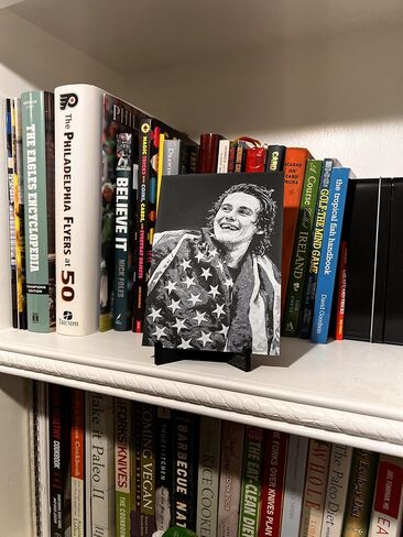 3D print of USA Hockey game winning scorer Jack Hughes wrapped in the American flag after USA Men's hockey wins the Gold medal. in Saudi Arabia