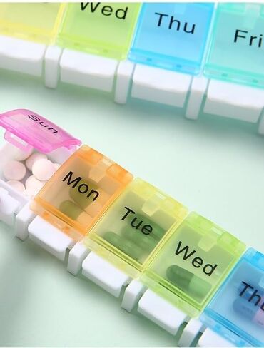 Weekly Pill Organizer 7 Day Pill Box with Spring Open Design and Labels, BPA-Free Medicine and Vitamin Holder for Travel, Supplements, Cod Liver Oil, Daily Medication in Saudi Arabia