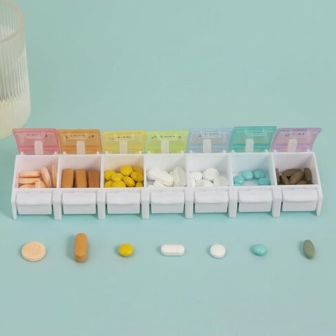 Weekly Pill Organizer 7 Day Pill Box with Spring Open Design and Labels, BPA-Free Medicine and Vitamin Holder for Travel, Supplements, Cod Liver Oil, Daily Medication in Saudi Arabia