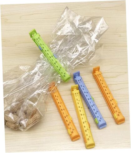 12Pcs Food Bag Clips Date Seal Heavy Duty Plastic Food Sealer Clips for Snacks Airtight Storage Kitchen Tool for Home Use Random Color in Saudi Arabia
