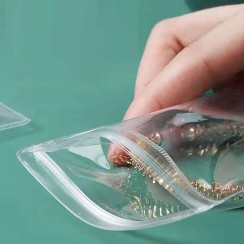 Small Plastic Bags, 100 Pcs Mini Baggies, Clear Plastic Jewelry Thick Self Sealing PVC Bags, Resealable Poly Baggies for Pill, Beads, Screws, Packaging (2x2.8") in Saudi Arabia