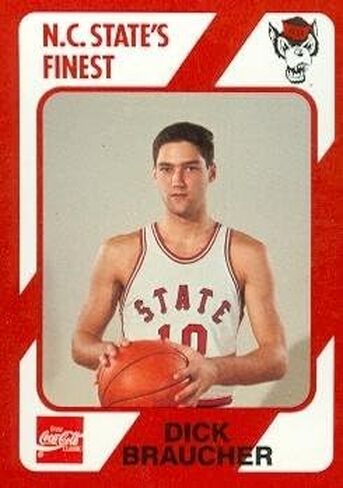 Autograph Warehouse Dick Braucher Basketball Card (N.C. North Carolina State) 1989 Collegiate Collection No.24 in Saudi Arabia