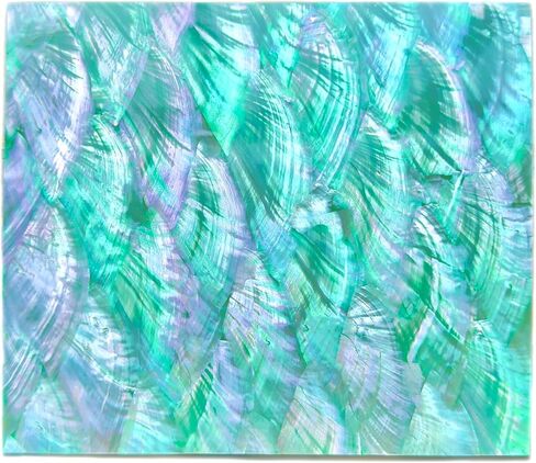 صدفة أذن البحر الطبيعية مطعمة بقشرة زرقاء أرجوانية، تستخدم لتزيين ترصيع الآلات الموسيقية وتغطية الأعمال اليدوية. الجزء الخلفي مزود بشريط أسود 3M على الوجهين (أخضر) in Kuwait