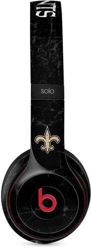 غلاف صوتي من Skinit متوافق مع Beats Solo 3 Wireless - تصميم NFL New Orleans Saints المرخص رسميًا in Kuwait