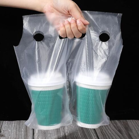 500 عبوة من أكياس بولي للشرب بمقبض مزدوج وحاملات تغليف بلاستيكية شفافة مع فتحة تعليق للأكواب مع مقبض للمشروبات والقهوة والعصائر والمتاجر ومطعم البار، بطول 30.48 سم × ارتفاع 27.94 سم in Kuwait