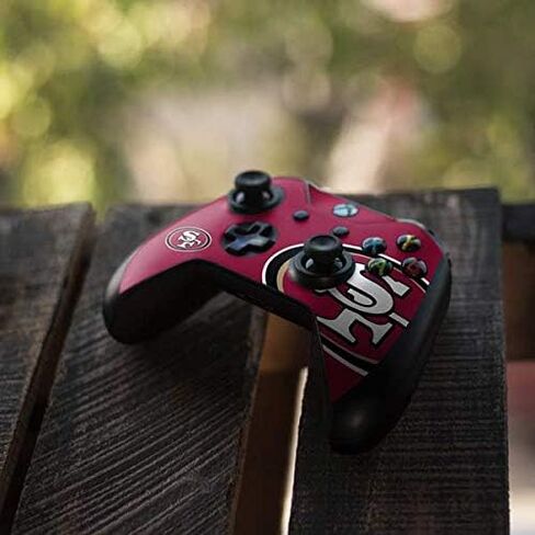 ملصق Skinit المخصص للألعاب متوافق مع وحدة تحكم Xbox One X - تصميم شعار كبير مرخص رسميًا من NFL San Francisco 49ers in Saudi Arabia