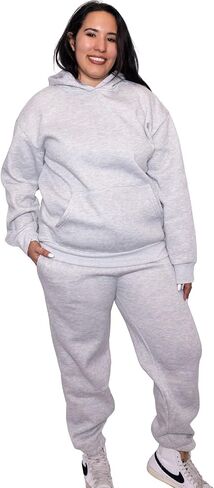 طقم رياضي نسائي كبير الحجم مكون من قطعتين ملابس خريفية عصرية ملابس صالة هوديي سروال سفر في المطار بذلة رياضية in Kuwait