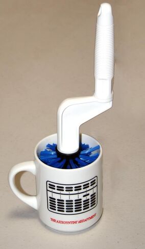 Spinning brush from Germany cleans bottom of mugs or drinking glasses easily in Saudi Arabia