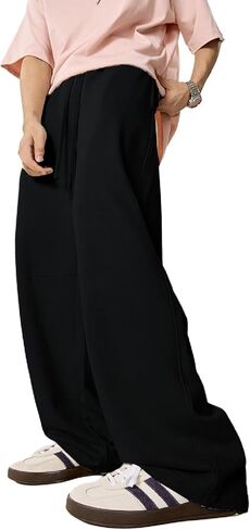 Mens Baggy Sweatpants Casual Pants Elastic Drawstring Waist with Pockets Loose Fit Wide Leg Joggers in Saudi Arabia