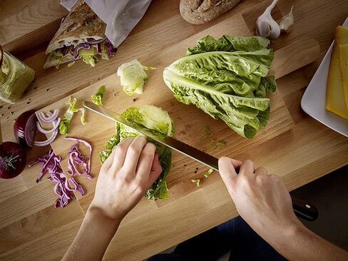 سكين سانتوكو بحافة مجوفة مقاس 5 بوصات من WÜSTHOF، أسود in Kuwait