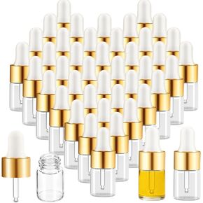 100 عبوة من زجاجات قطارة زجاجية صغيرة سعة 2 مل مع أغطية ذهبية، وقوارير زيت عطري صغيرة، وحاويات عينات سفر فارغة للسوائل والعطور والصبغات ومستحضرات التجميل in Kuwait